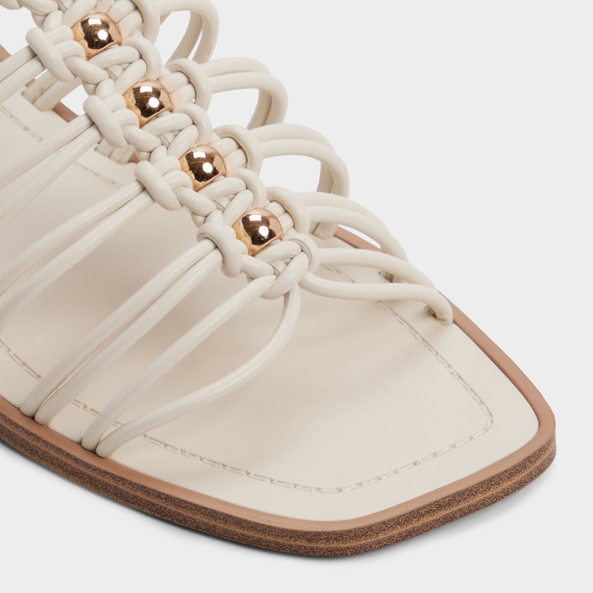Unoma in White Bone - Strappy flat sandal - White/bone