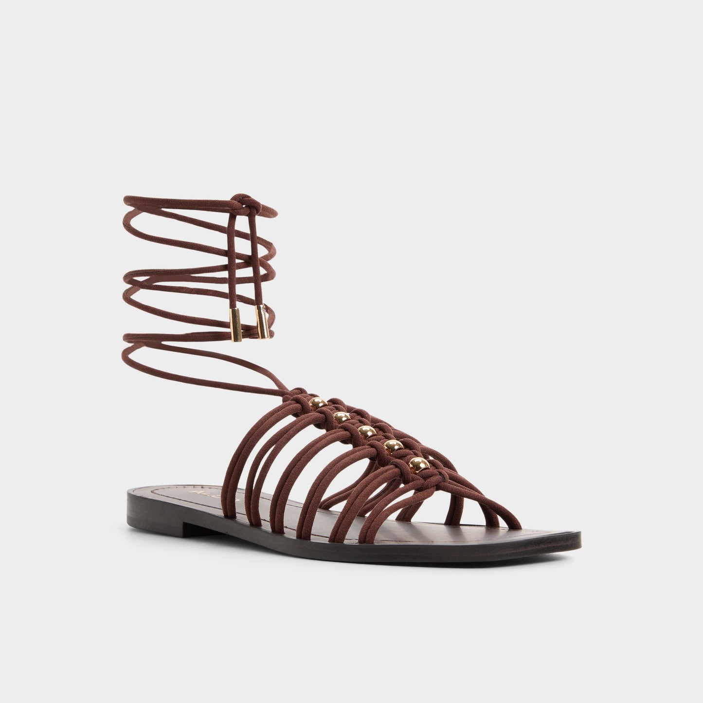 Unoma in Dark Brown - Strappy flat sandal - Dark brown