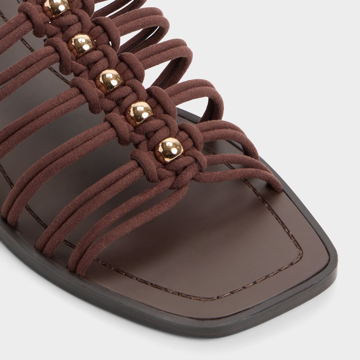 Unoma in Dark Brown - Strappy flat sandal - Dark brown